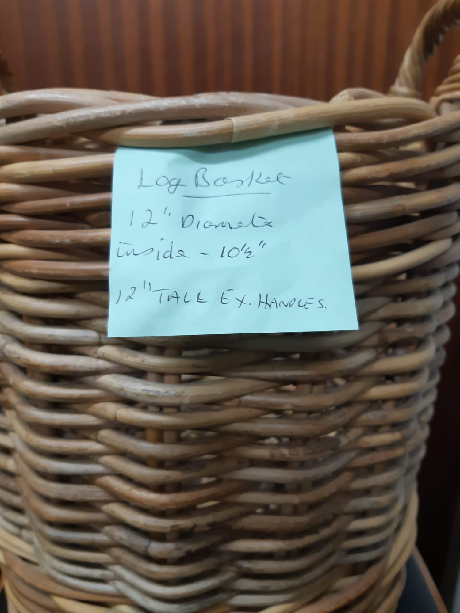 STURDY 12" TALL WICKER LOG BASKET. VERY GOOD CONDITION.