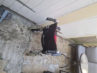 Push along wheelchair 