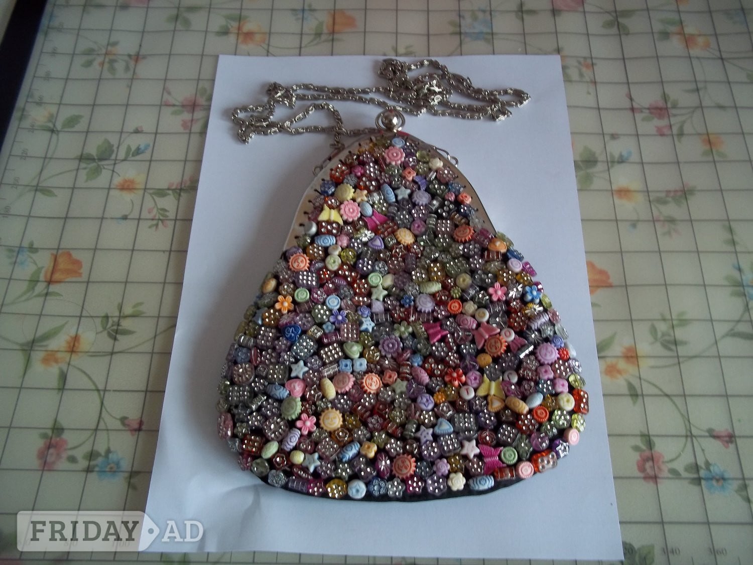 Beaded multi coloured clip top bag in Lewes