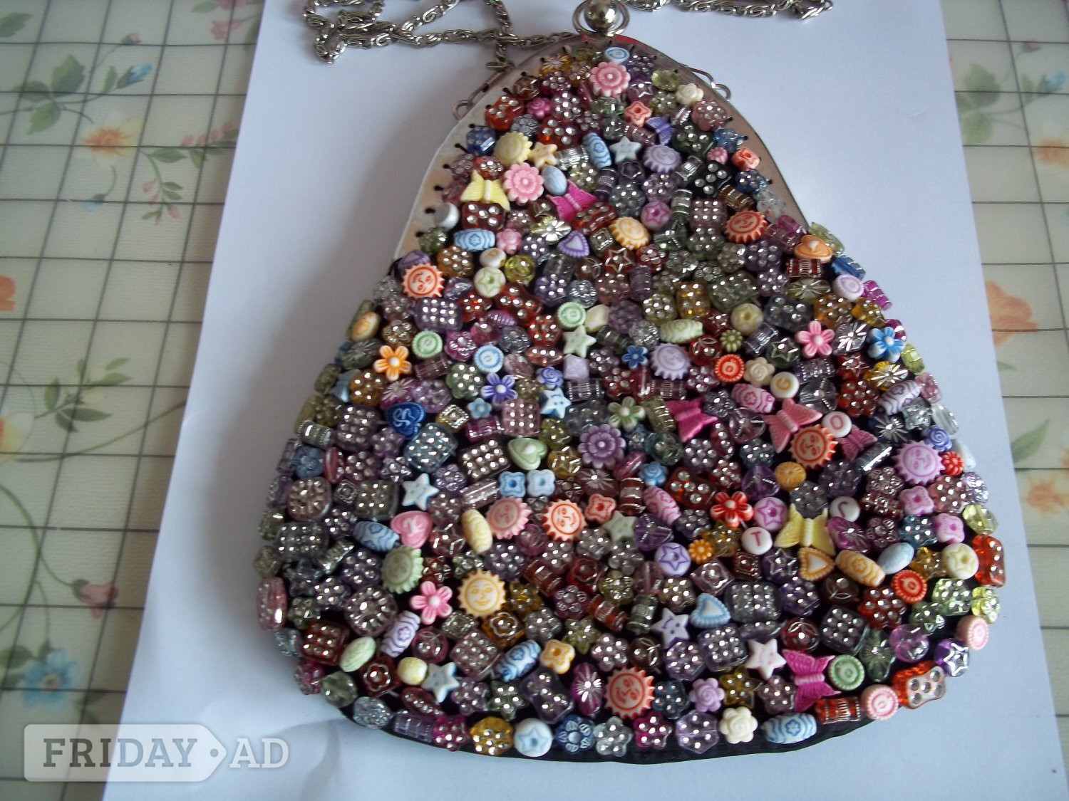 Beaded multi coloured clip top bag