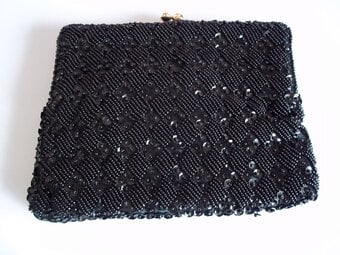 Clip top small black beaded clutch bag