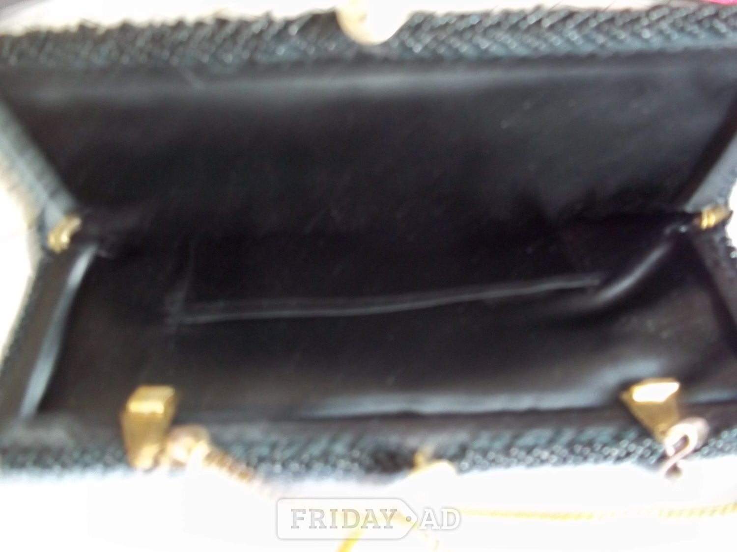 Clip top small black beaded clutch bag
