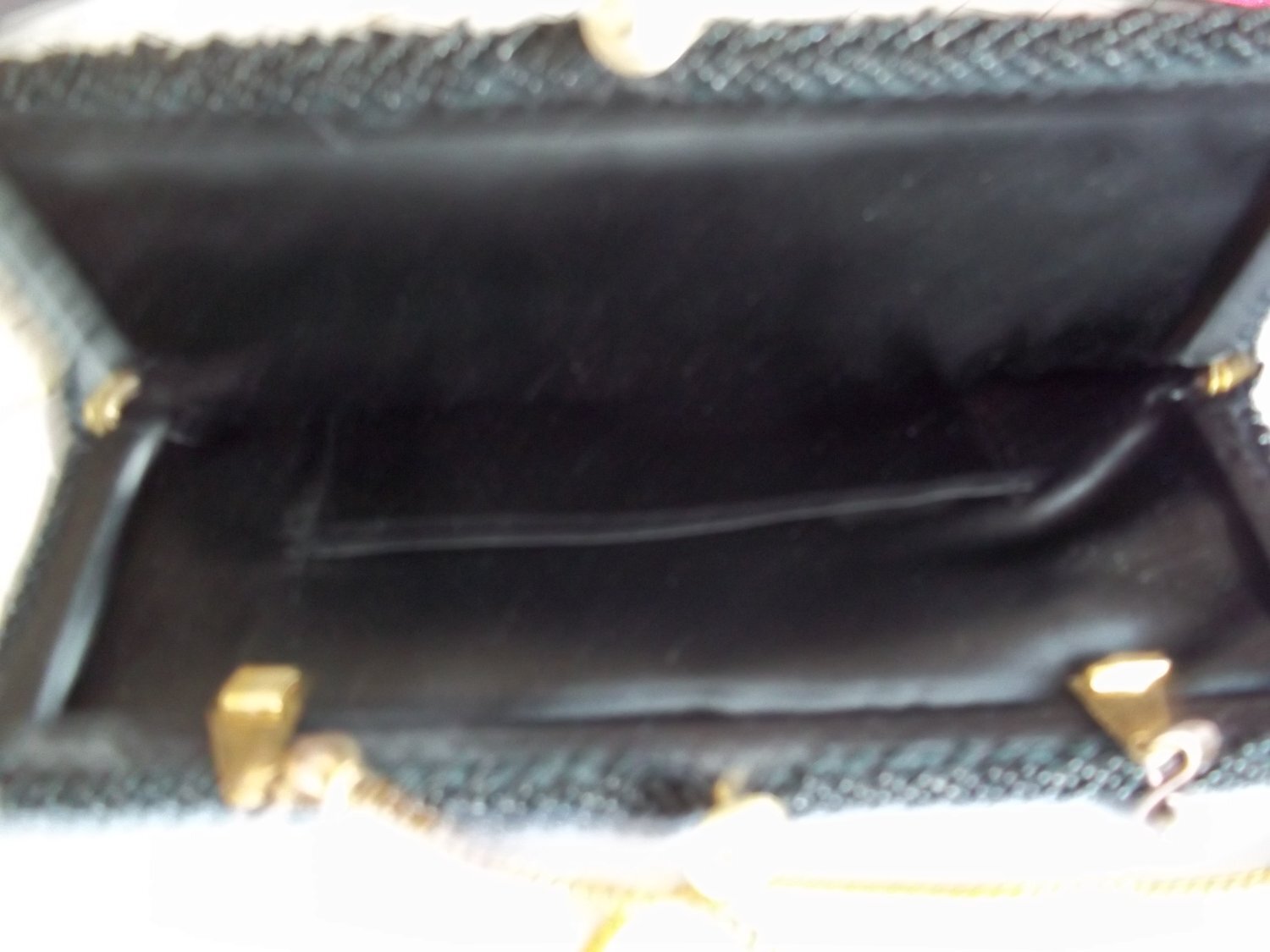 Clip top small black beaded clutch bag
