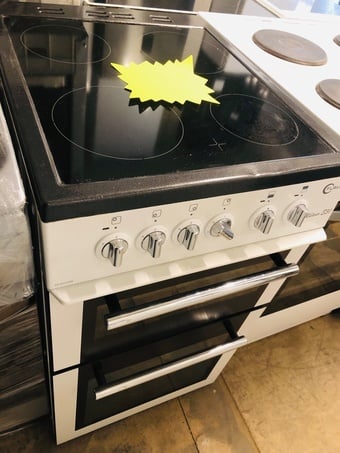 Flavel 50cm wide electric cooker with double oven and dual grill.