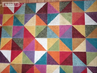 Multi coloured large floor rug