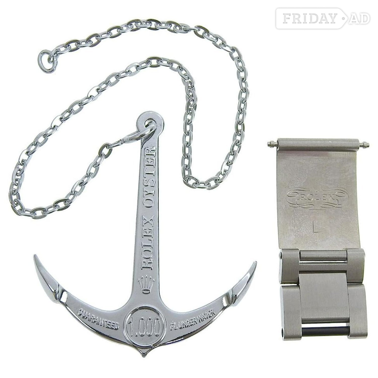 Rolex Sea Dweller anchor, and large extension bracelet link.