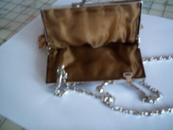 Bronze colour, clip top beaded bag for sale
