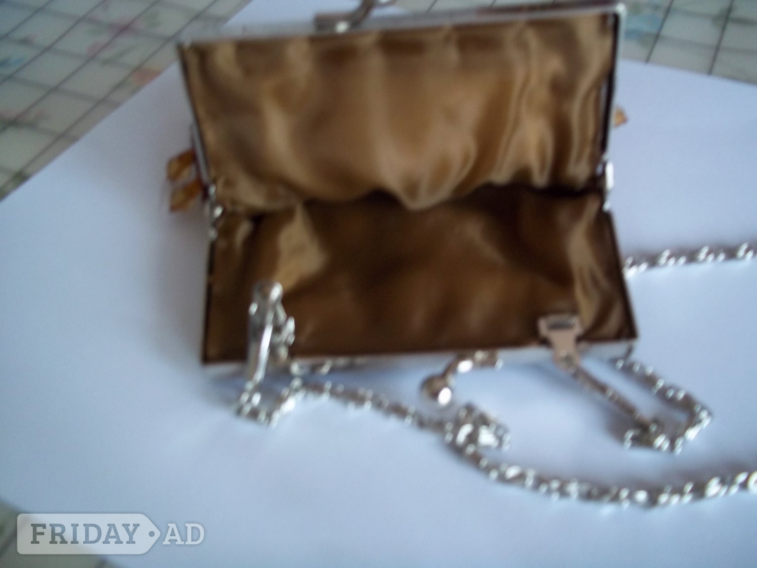 Bronze colour, clip top beaded bag for sale in Lewes