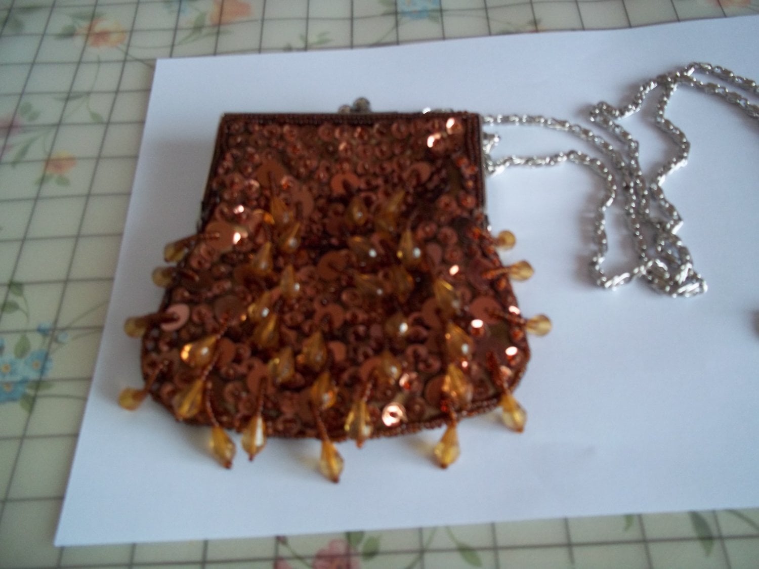 Bronze colour, clip top beaded bag for sale