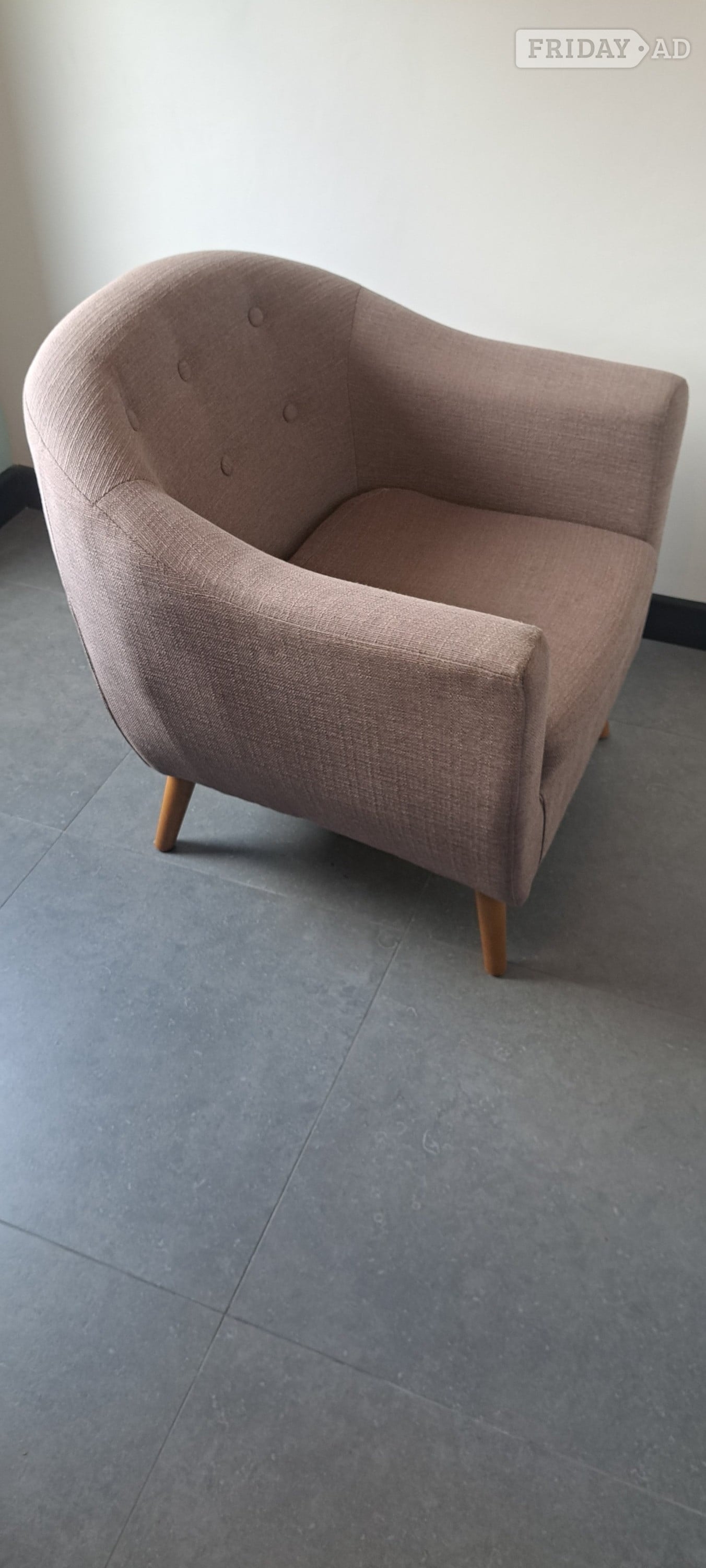 UPHOLSTERED ARMCHAIR. TUB CHAIR WITH WOODEN LEGS. TAUPE COLOURED 