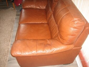 Leather two-seater sofa. 