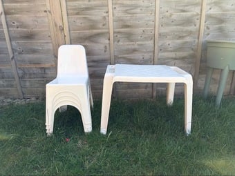 Kids white plastic table and 4 chairs