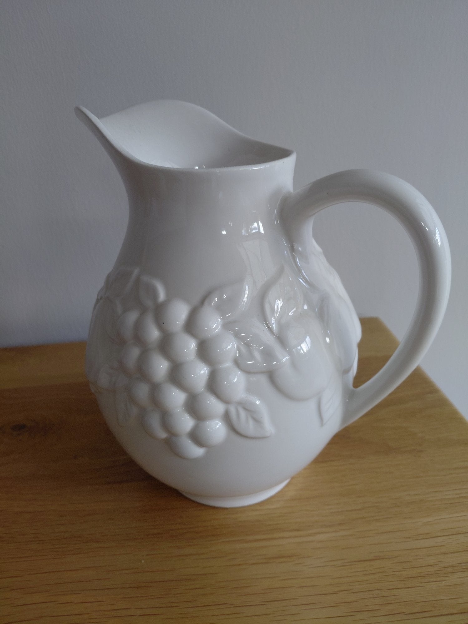 Winchester White Ceramic Jug with Fruit Embossing – Good Condition