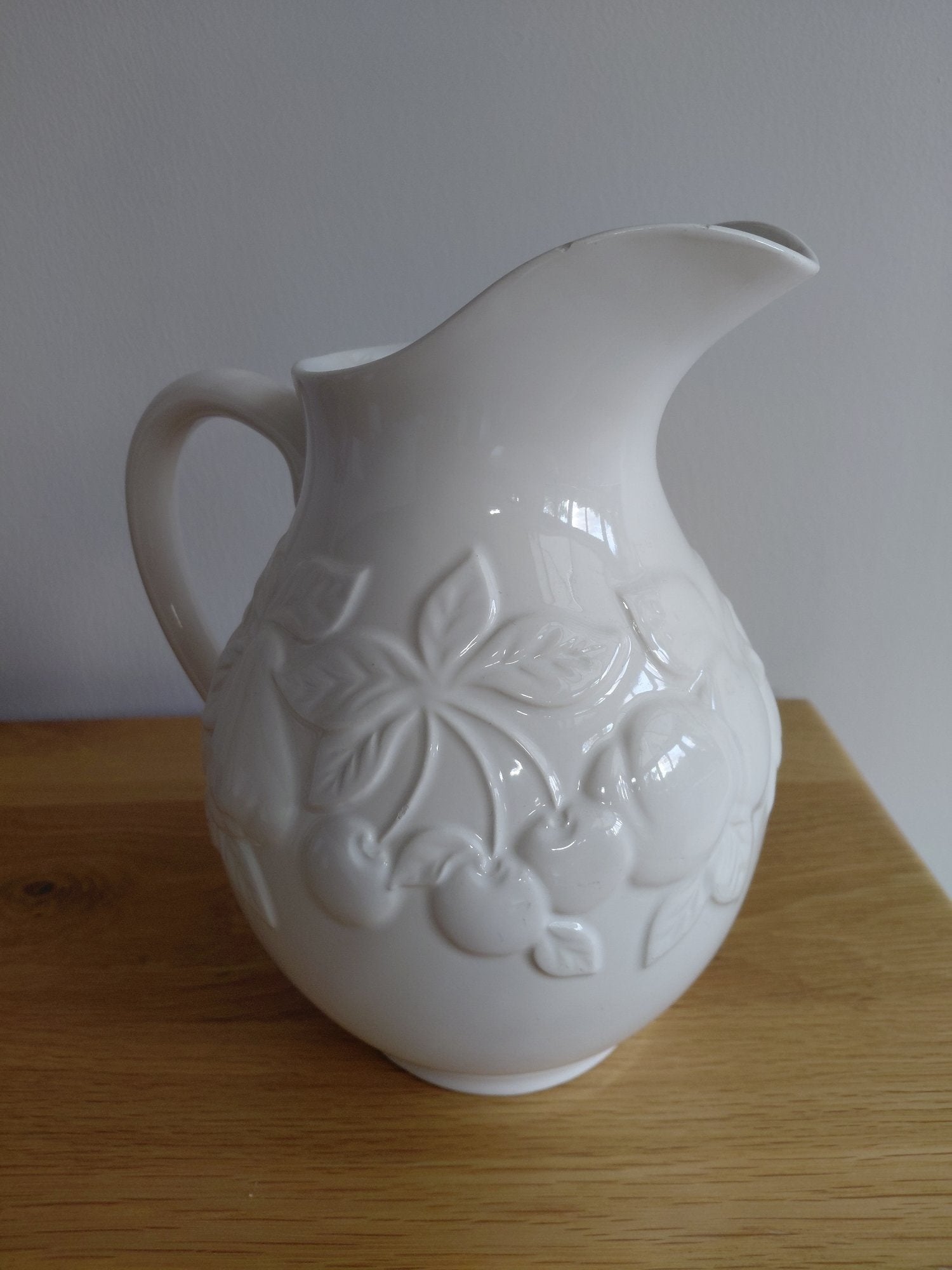 White Ceramic Jug with Fruit Embossing – Good Condition - Cookware & Dining