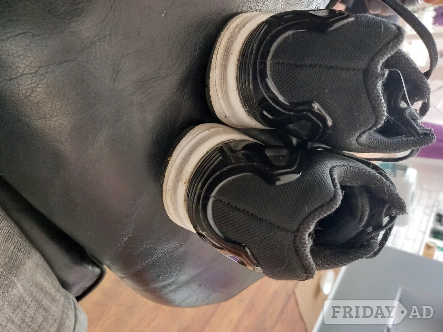 Female Adidas black trainers 