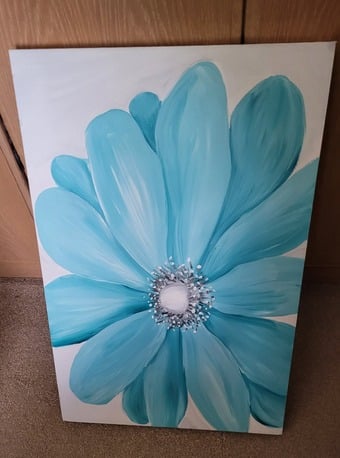 Large painting of flower on canvas