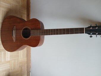 Guitar. Vintage brand acoustic. Two years old barely used 
