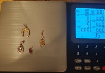 Job lot of 9ct gold pendants and charm 