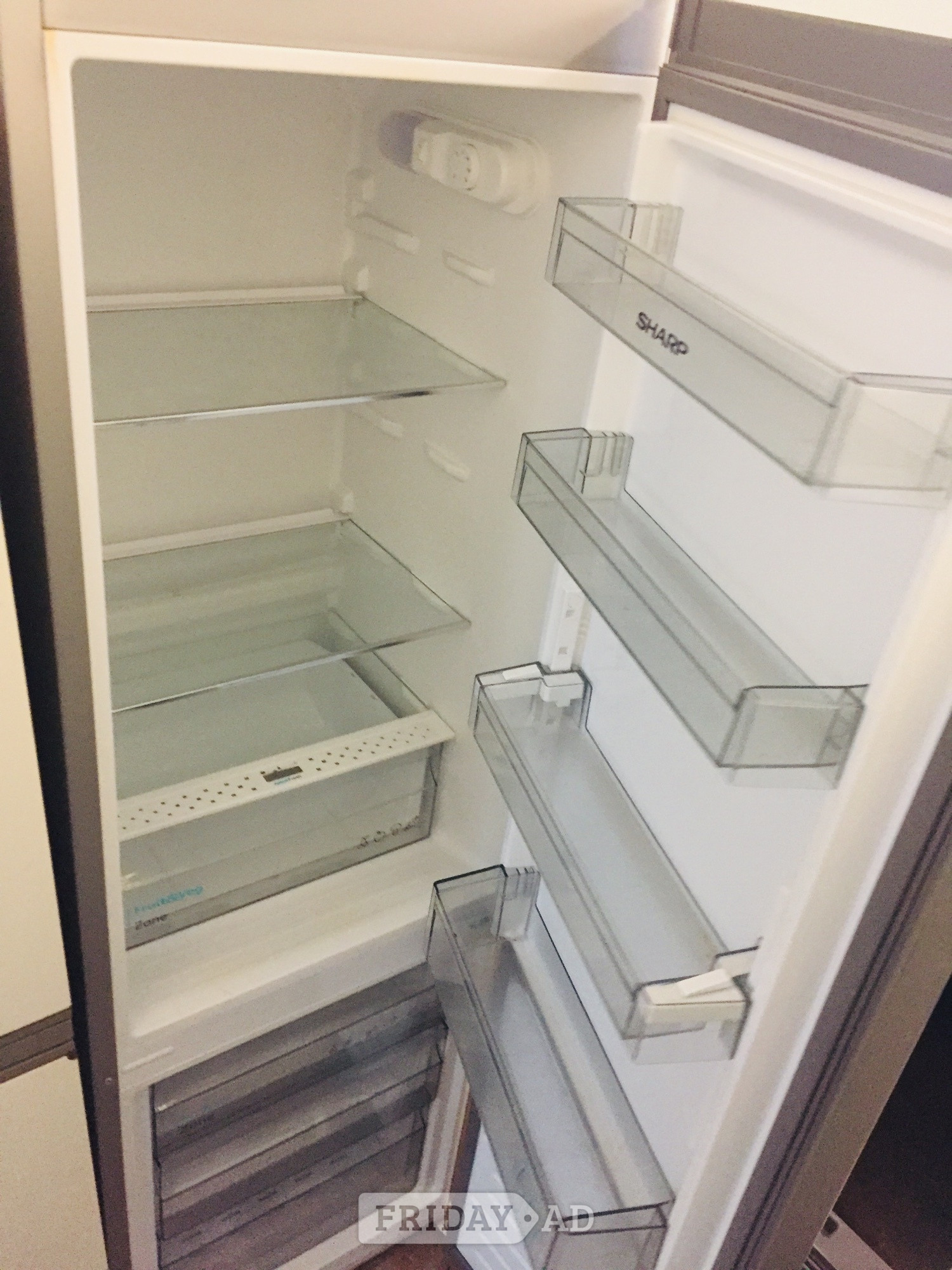 Sharp silver colour frost free fridge freezer as new £165