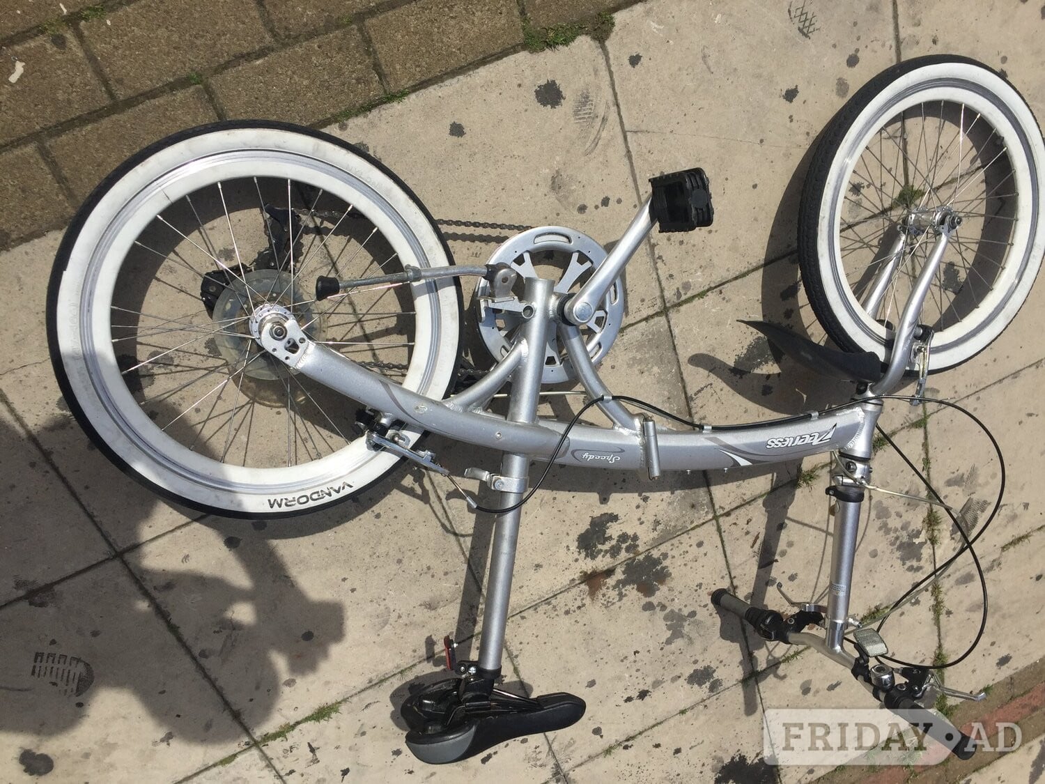 se166qe mix of the speed of a road racer fixie folder BMX bike  in London