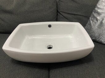 white countertop basin