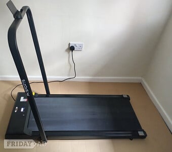 Black Electronic Foldaway walking machine. 