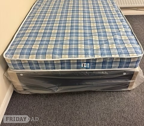 4 Foot Economy Mattress with black divan base