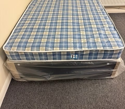4 Foot Economy Mattress with black divan base