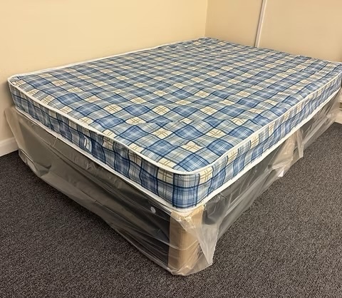 4 Foot Economy Mattress with black divan base - Furniture in Rotherham