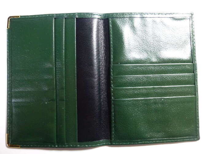 Rolex genuine leather wallet and passport holder.