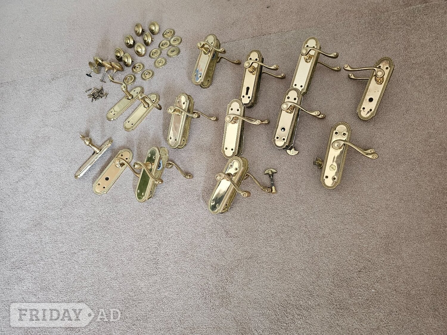 Solid brass door handles and knobs in New Romney