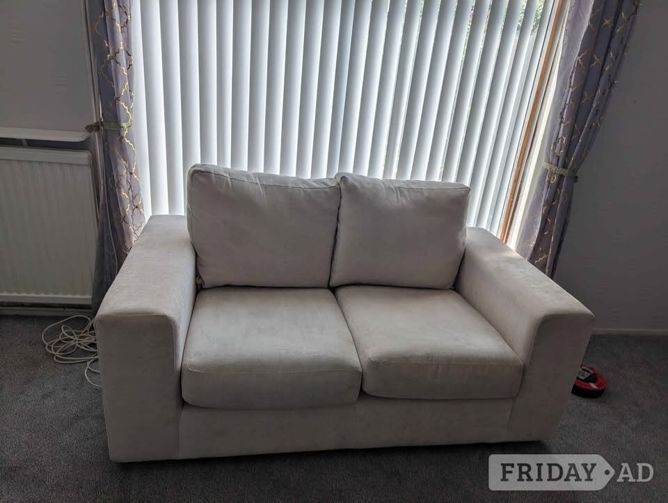 Cream 2 seater sofa