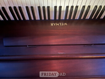 A Welmar upright piano