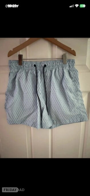 H&M light blue/white swimming shorts in size small