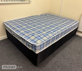 4 Foot Economy Mattress with black divan base
