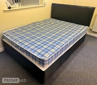 4 Foot Economy Mattress with black divan base and headboard