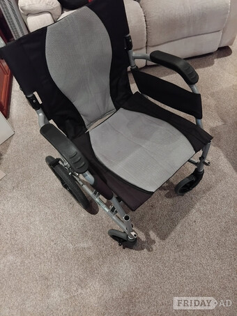 Light weigh wheelchair  with  footrest  and cushion