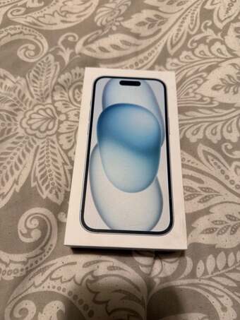 iPhone 15, Blue, 128GB. As Good As New