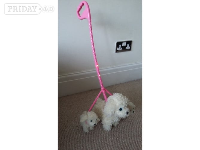 Animagic dog and pups attached on a lead good condition.