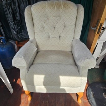 Lovely nearly new comfortable armchair in patterned beige