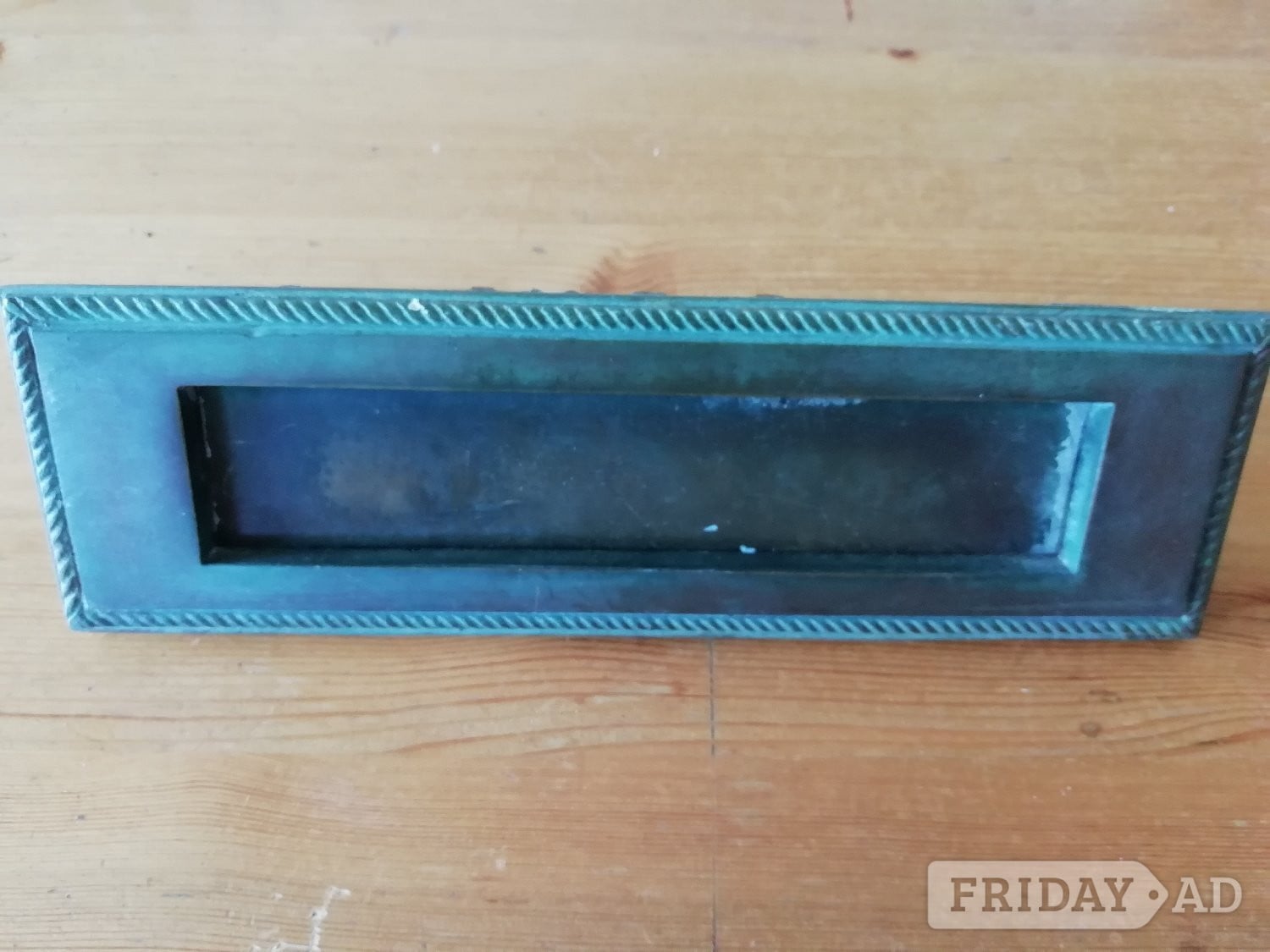 Letterbox, door handle & key escutcheon in solid brass in Hove