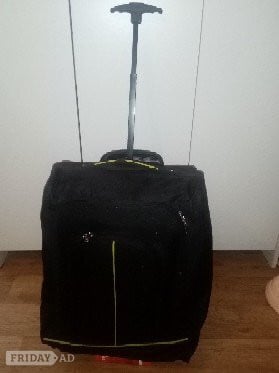 Medium sized pull along travel luggage 