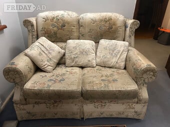 Twin two-seater sofas plus matching arm chair 