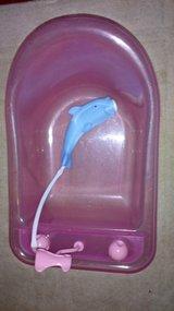 Baby doll bath with dolphin attached shower