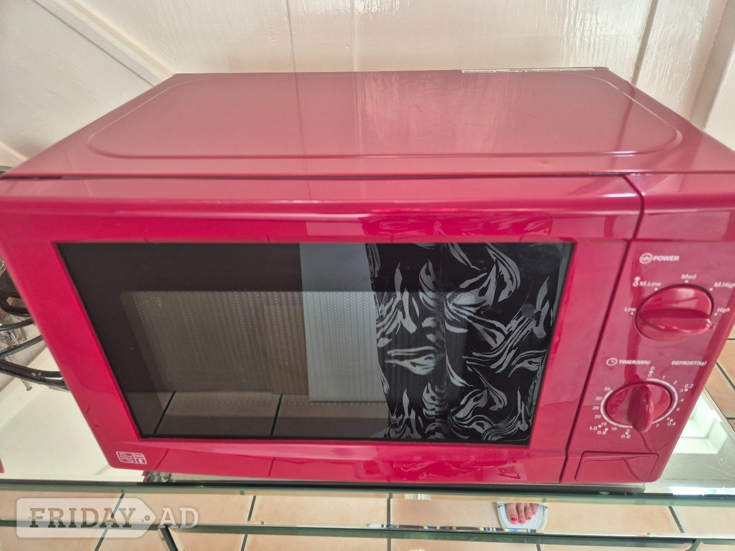 Red microwave, good condition 