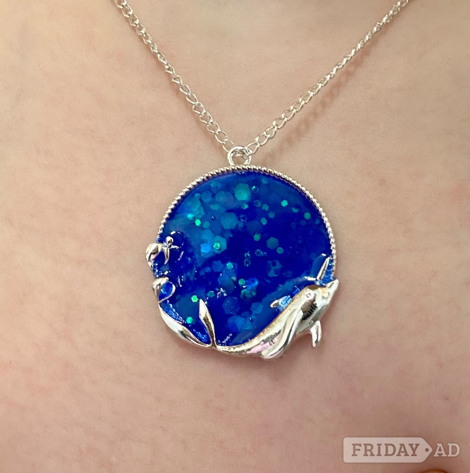 Handmade glitter resin dolphin pendant and necklace in Peterborough