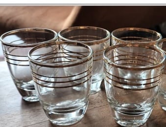 5 X gold, gilded rimmed shot glasses, made in France 
