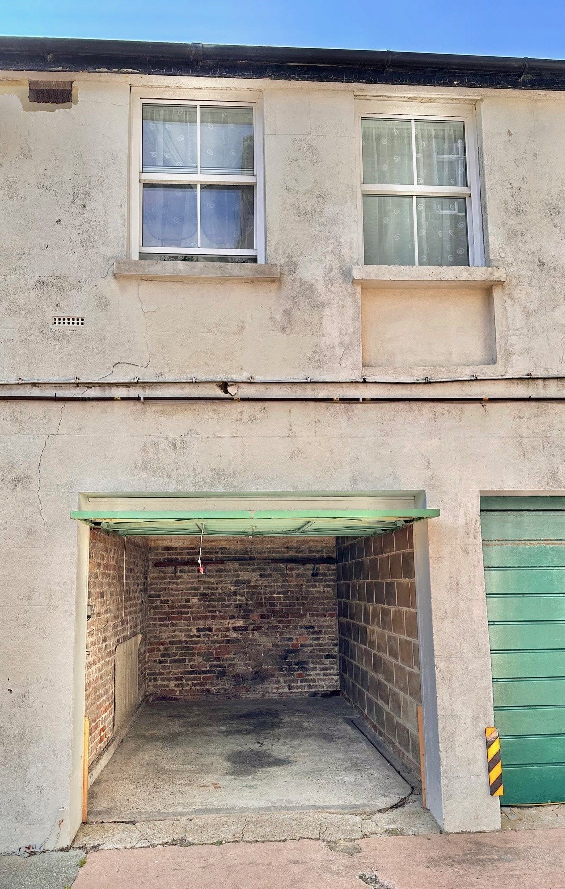 Garage in Town Centre with flats above