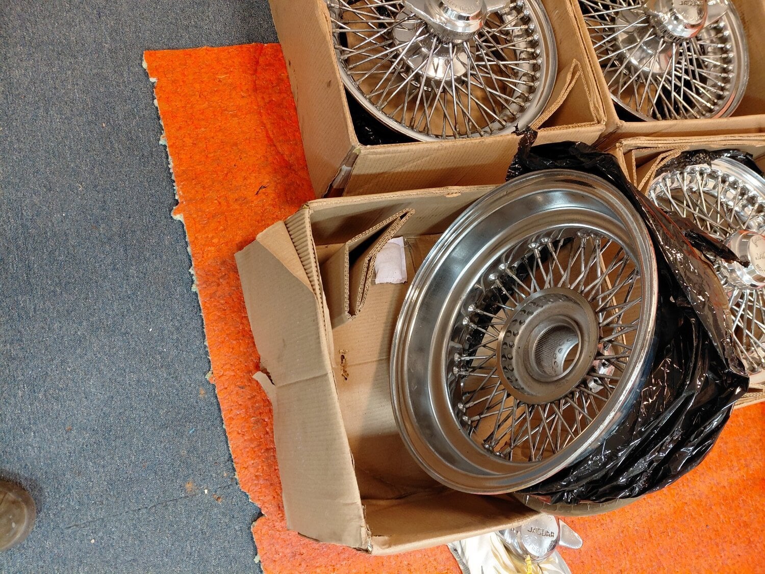 Jaguar 4 original factory Chrome  wire wheels + spinners  - Parts & Accessories in Gloucester