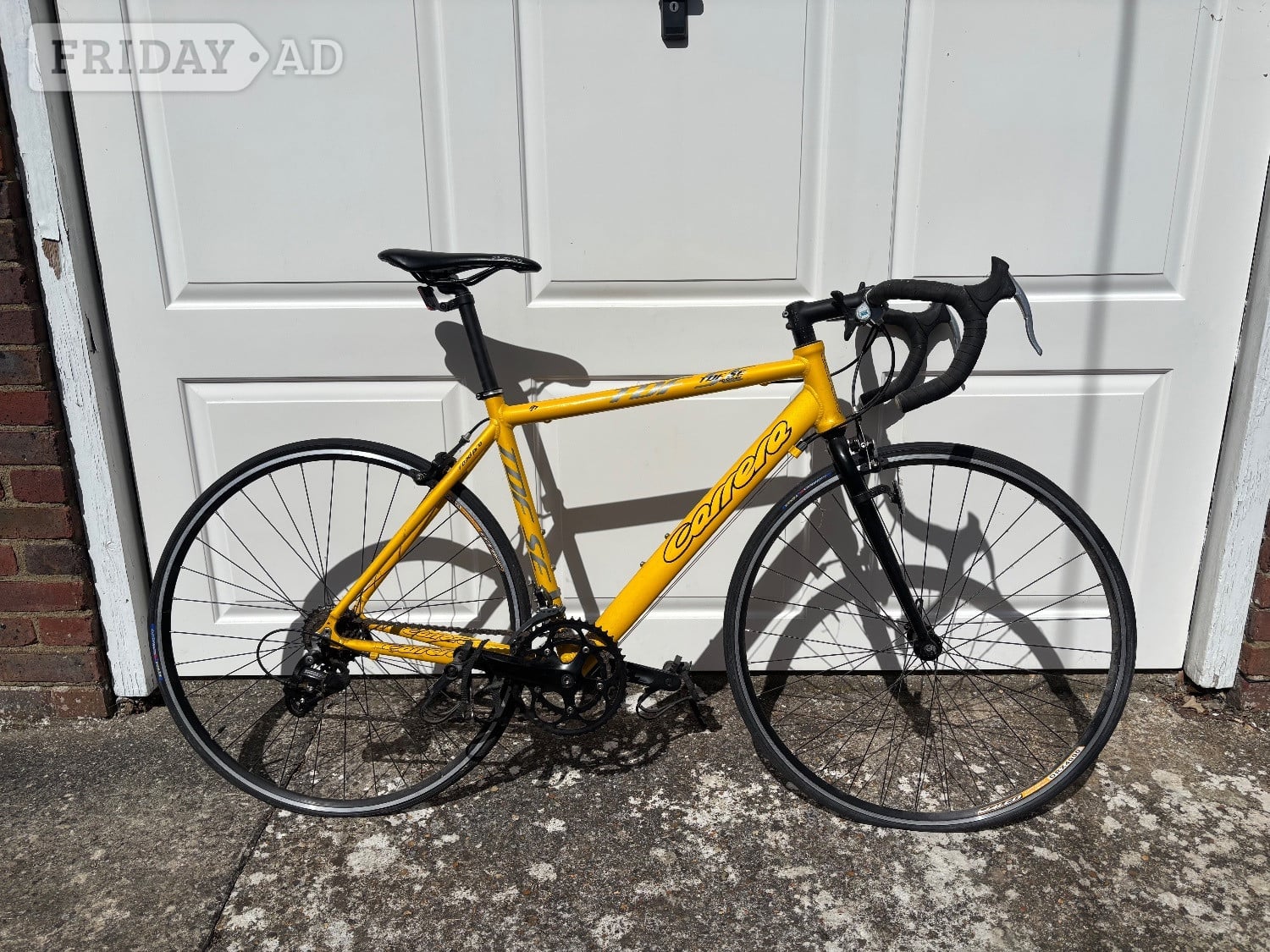 Carrera Virtuoso lightweight frame in bright yellow in Bexhill-On-Sea